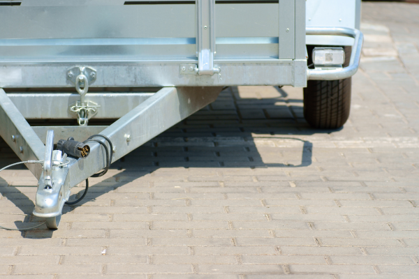 A close-up of an aluminum trailer hitch.